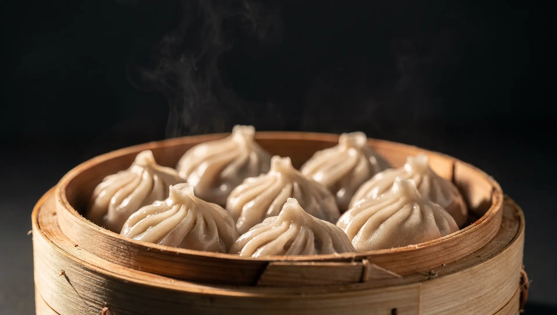 Steaming basket of Jade House soup dumplings